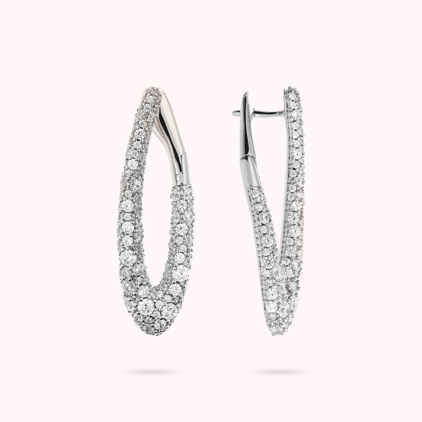 Boucles d'oreilles ovales blanches en zircone cubique pavée