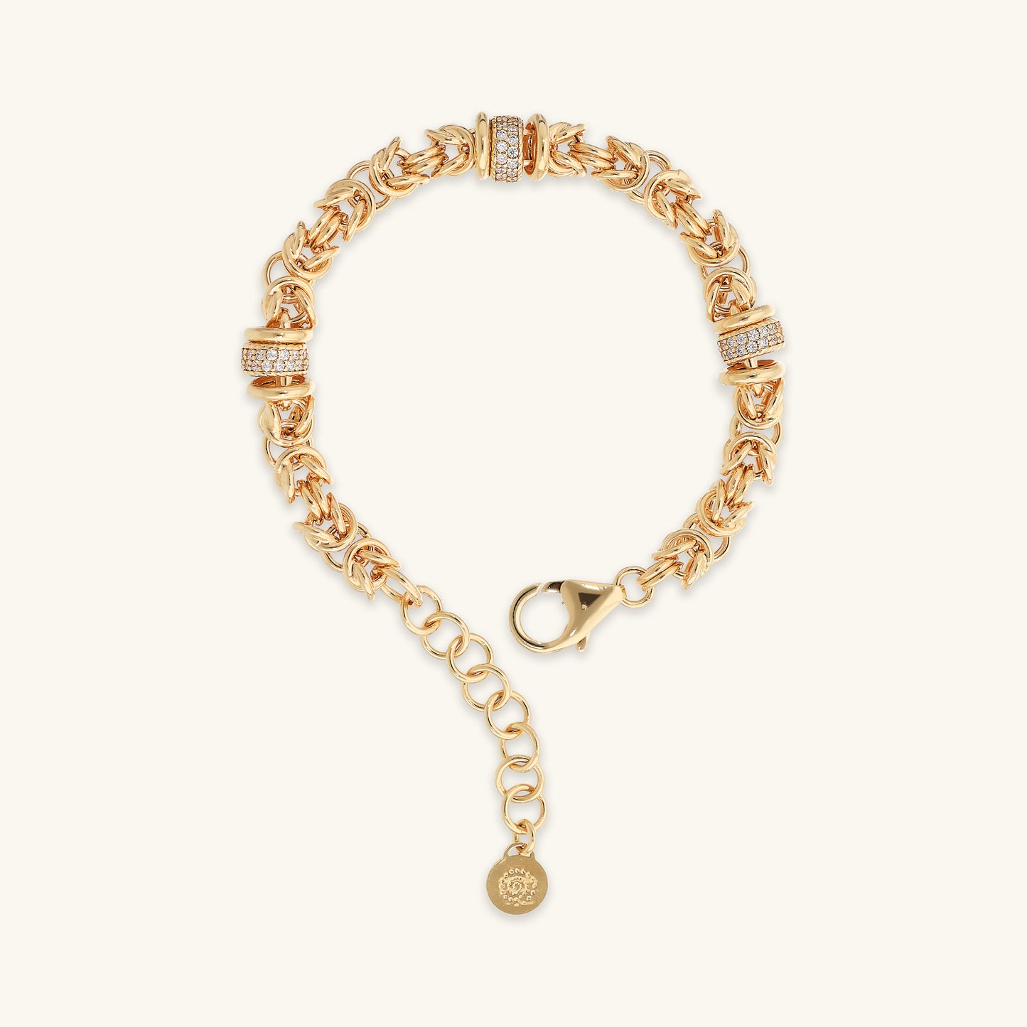 Bracelet chaîne byzantine avec rondelles pavées de zircones cubiques