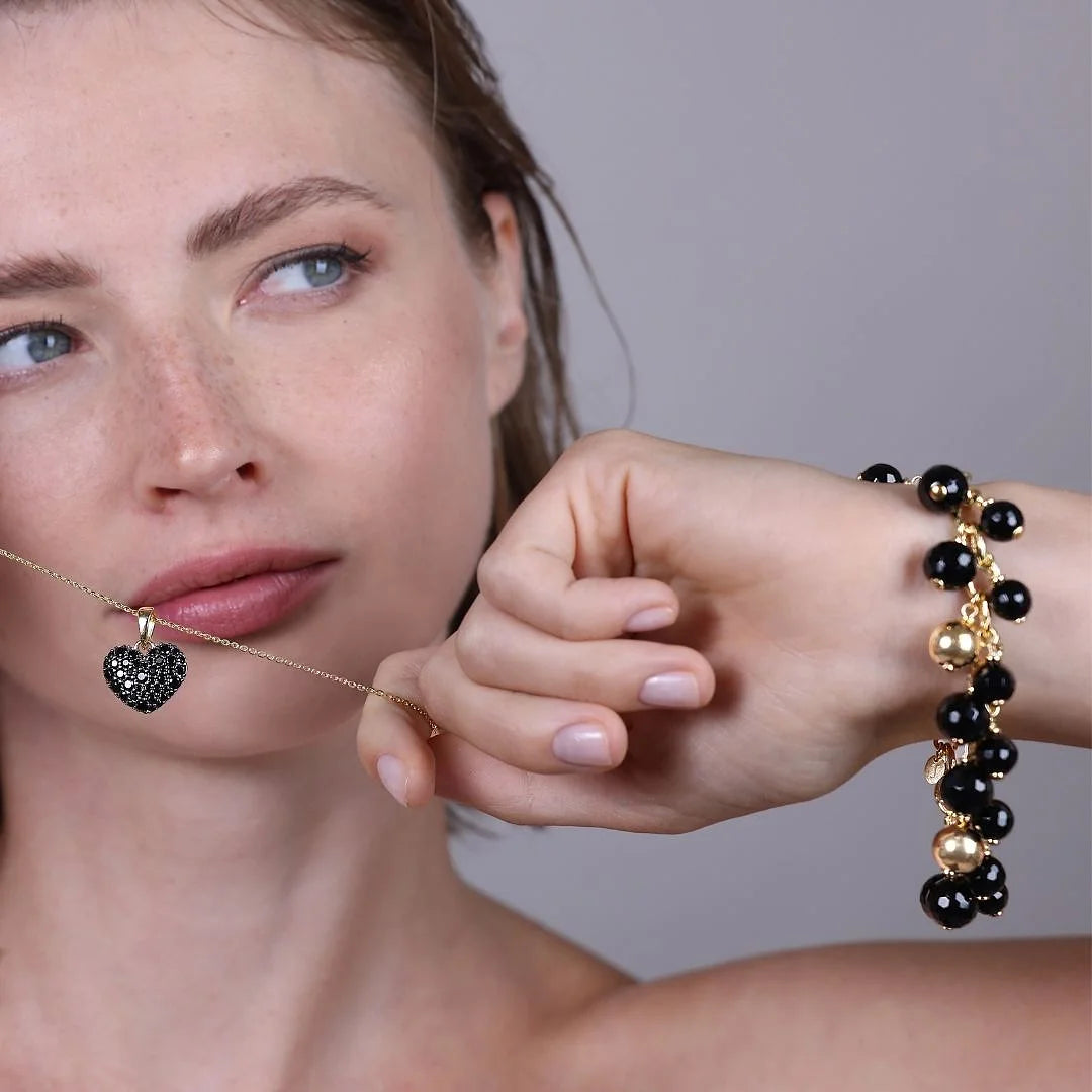 Bracciale con Charm in Onice Nero Sfaccettato e Bead Lucide in Argento 925 placcato Oro Giallo 18Kt