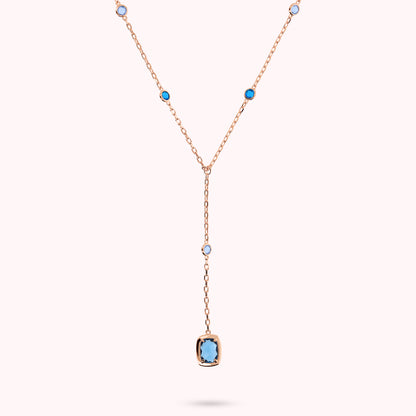 Collier à nœuds avec pierres précieuses rondes et baguettes