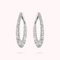 Boucles d'oreilles ovales blanches en zircone cubique pavée